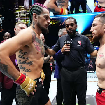 Sean O’Malley and Merab Dvalishvili stare down before the opening round of their UFC 306 title fight.