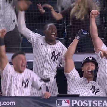 The dugout was so excited, as Judge's dinger brought the score to 6–6.