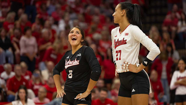 Nebraska volleyball libero Lexi Rodriguez and outside hitter Harper Murray react during play at the Husker Invitational.