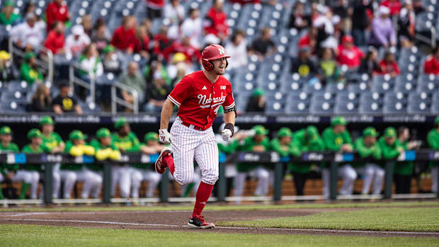 The left -hand player of Nebraska, Gabe Swansen, first takes place after one of his two strokes against Oregon during the Big Ten tournament.