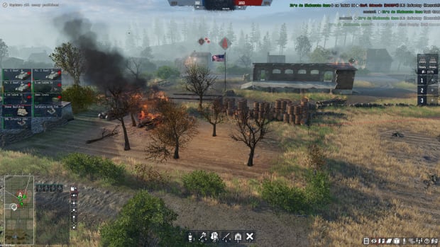 Men of War 2 screenshot showing a fire in the middle of a village.
