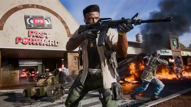 A Black Ops 6 character holding an assault rifle outside a burning chain store