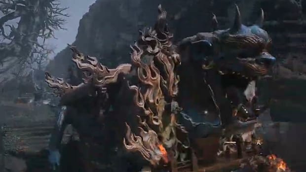 Black Myth Wukong's Brown-Iron Cart boss, rearing up into the air in front of the Monkey King