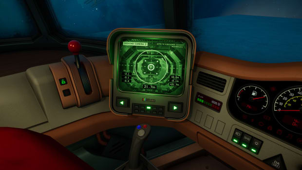 Star Trucker screenshot. POV shot from the truck's cockpit, looking down at a monitor showing the driver what's behind them.