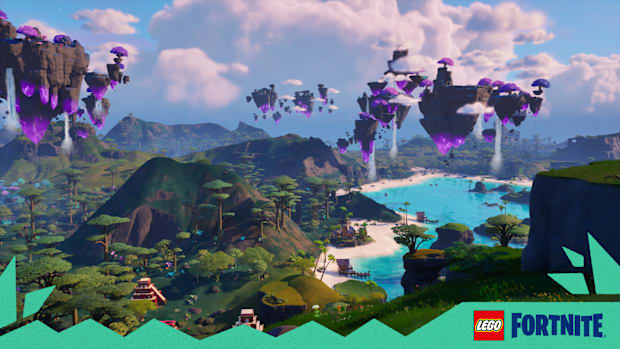 LEGO Fortnite screenshot. Mountainous terrain with a large lake in the middle, islands float in the sky around it.