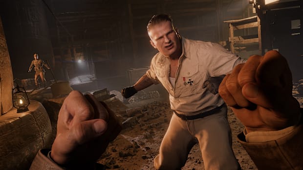 Screenshot from Indiana Jones and the Great Circle of Indiana punching a big man