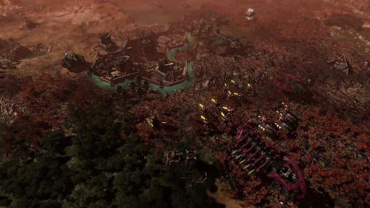 Warhammer 40,000: Gladius - Relics of War screenshot showing a Nacron army advancing on a city.
