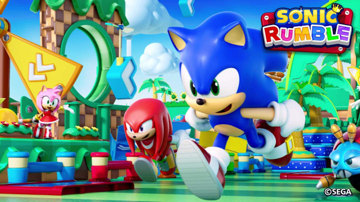 Sonic and Knuckles running through Green Hill Zone while Amy waves them on