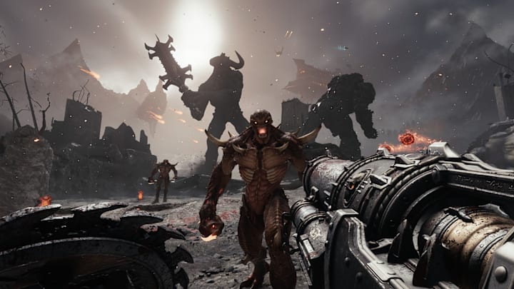 A demon approaches the camera as an Atlan fights a Titan demon in the background.