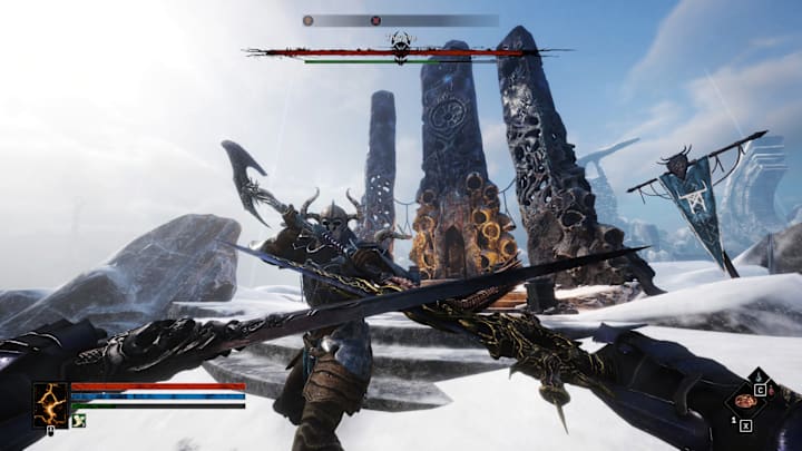 Fihgitng an armoured warrior with an axe.