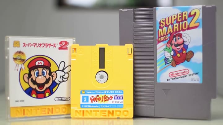 A copy of the Japanese version of Super Mario Bros 2 next to the American NES cartridge.