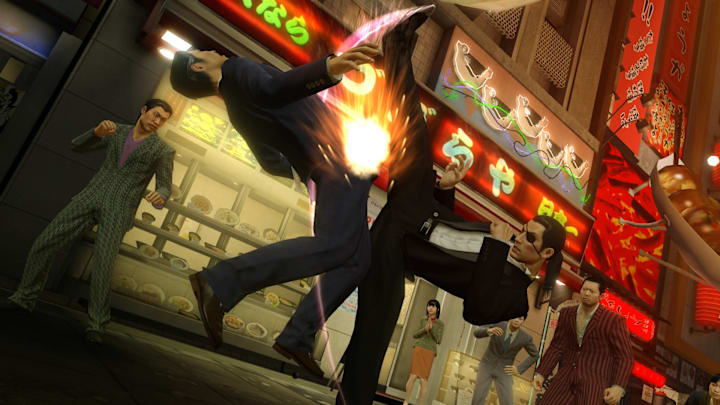 A suited Majima kicks a man into the air in Yakuza 0: Director's Cut