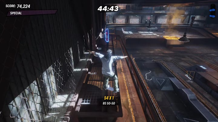 A player atop a raised platform about to collect a secret deck in Tony Hawk's Pro Skater 3+4's Foundry level
