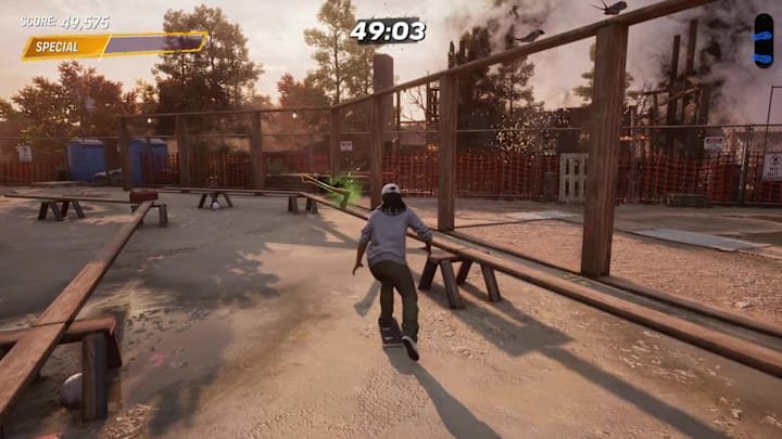 A player skating towards an axe in a construction site in the Suburbia level in Tony Hawk's Pro Skater 3+4