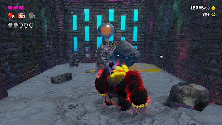 A stone enemy with a silver baloon attached to their head.