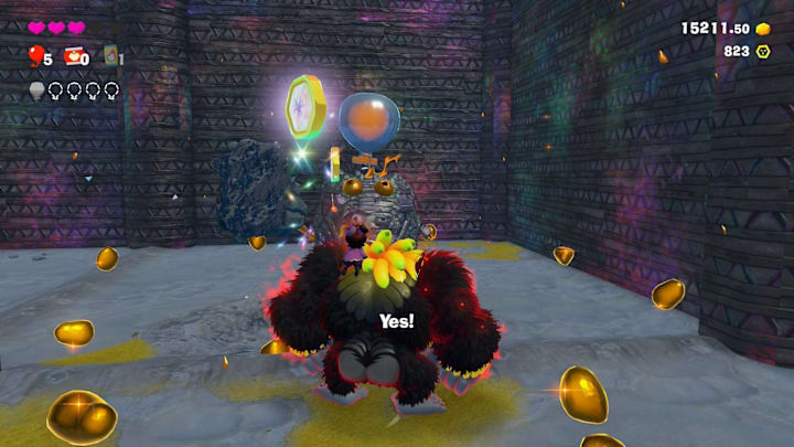 Another stone enemy with a silver balloon attached to its head.