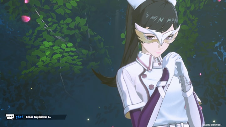 Mirian standing in a green grove with her mask on.