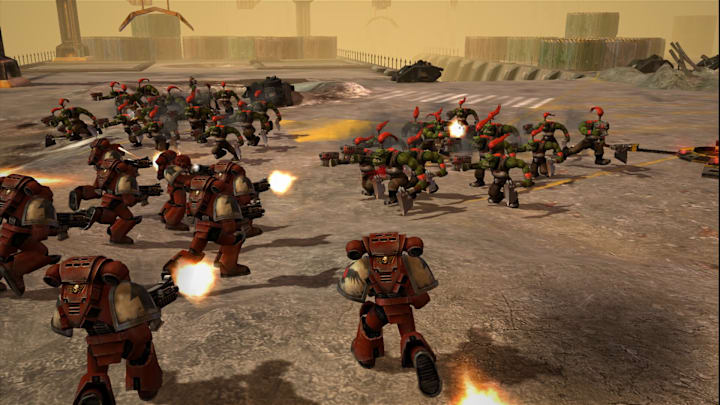 An army of Space Marines firing their guns at the enemy.