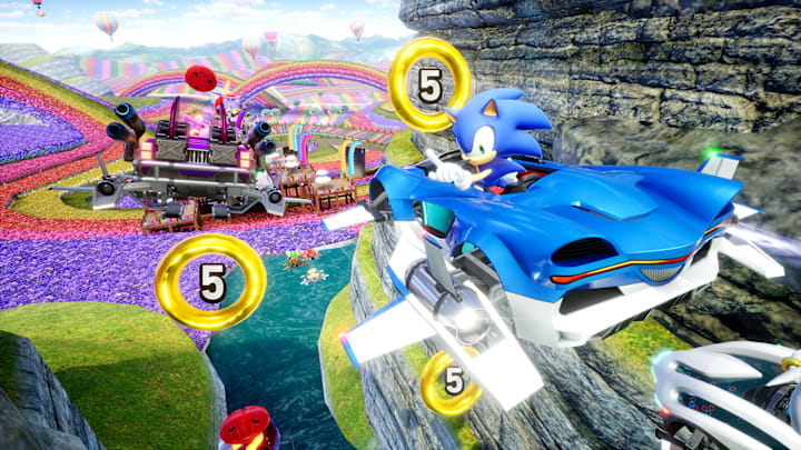 Sonic in a racecar, gliding through the air.