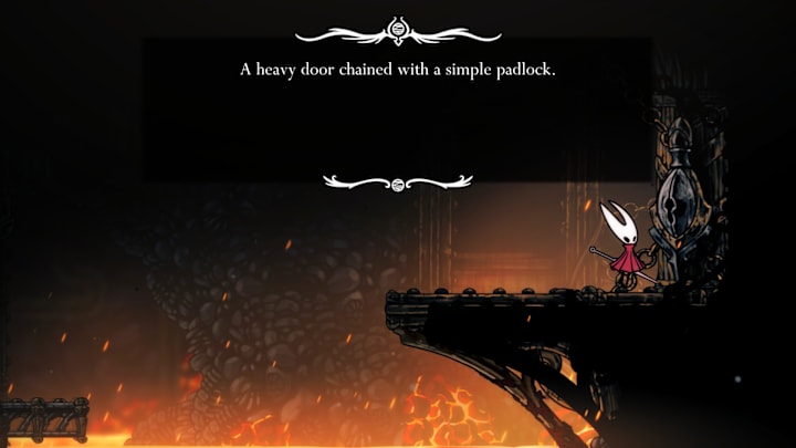 A locked door above a pit of lava.