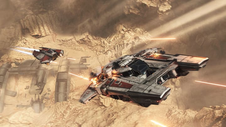 An enemy ship chases the player ship over a desert planet in Jump Space