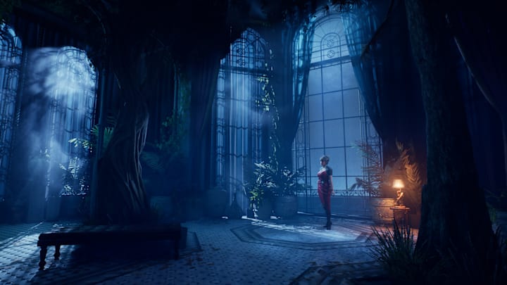 Lou stands alone in a dark room in Bloodlines 2.