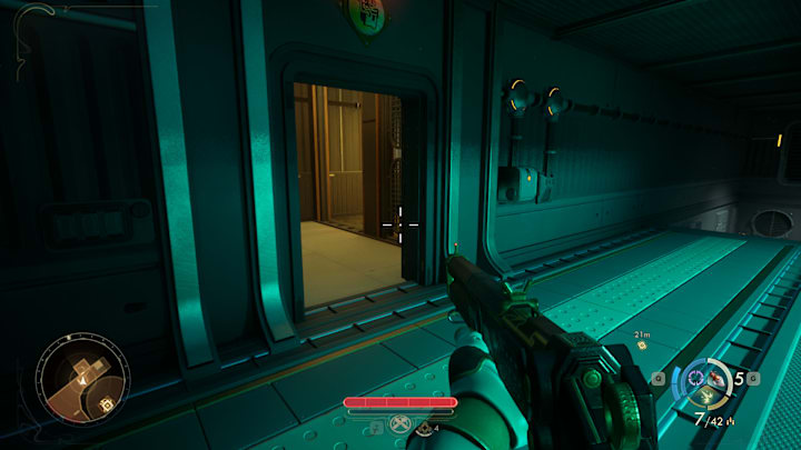 A door along a sci-fi corridor.
