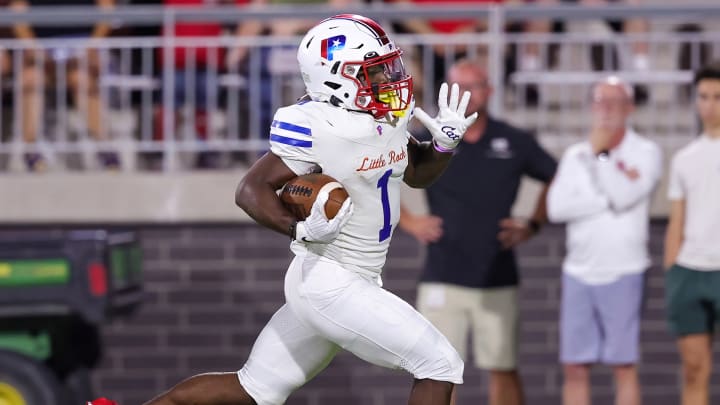 Little Rock Parkview running back Monterrio Elston scores one of his two rushing touchdowns Saturday night. 