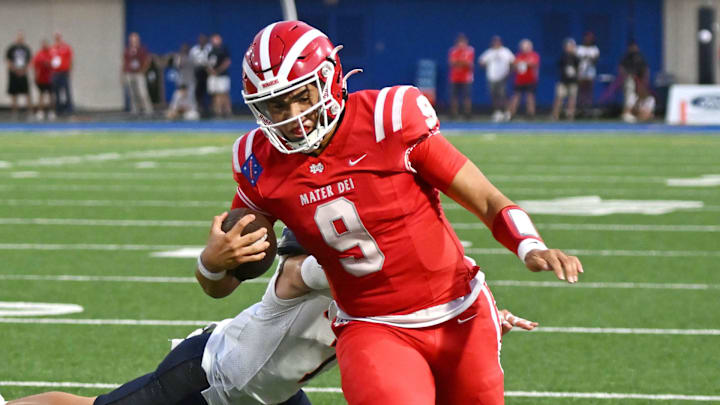 Mater Dei quarterback Ashton Beierly carries during Friday night's win over Bishop Gorman at the Santa Ana Bowl.