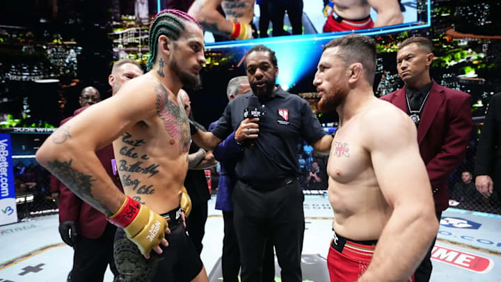 Sean O’Malley and Merab Dvalishvili stare down before the opening round of their UFC 306 title fight.