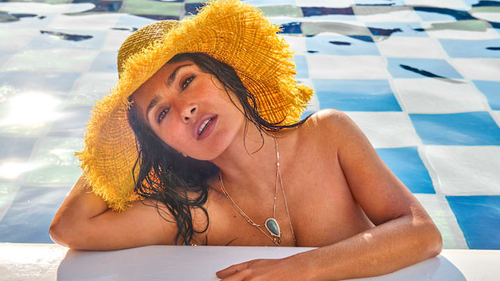 Salma Hayek Pinault was photographed by Ruven Afanador in Mexico. Hat by Alémais. Necklace by Jacquie Aiche. Salma Hayek Pinault was photographed by Ruven Afanador in Mexico. Hat by Alémais. Necklace by Jacquie Aiche.