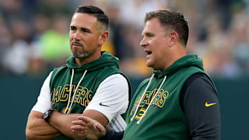 Green Bay Packers Head Coach Matt LaFleur and General Manager Brian Gutekunst talk on the field during Green Bay Packers Family Night on Aug. 2, 2025, at Lambeau Field in Green Bay, Wis.