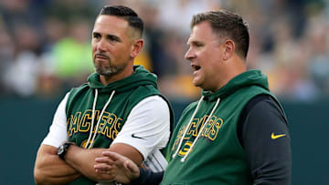 Green Bay Packers Head Coach Matt LaFleur and General Manager Brian Gutekunst talk on the field during Green Bay Packers Family Night on Aug. 2, 2025, at Lambeau Field in Green Bay, Wis.