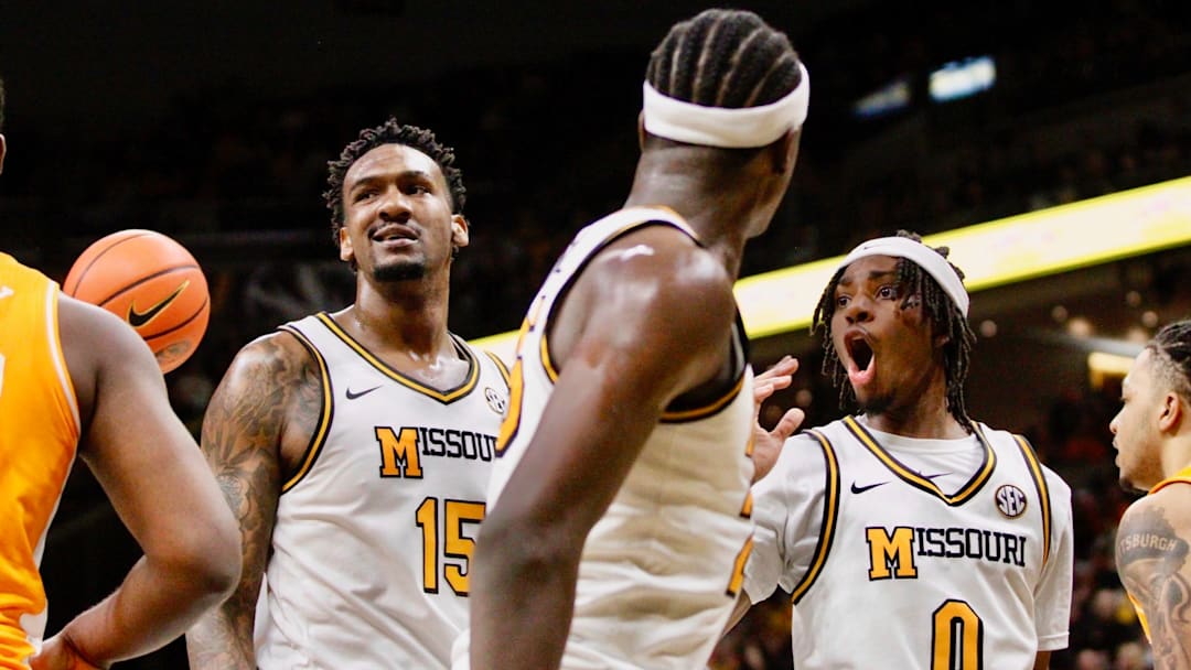 Feb 24, 2026; Columbia, Missouri, USA; Missouri Tigers guard Anthony Robinson II (0) and center Shawn Phillips Jr. (15) react against Tennessee