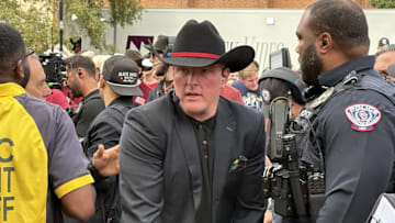 ESPN's Pat McAfee arrives on the set of College GameDay in Norman on Saturday.