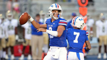 Folsom junior quarterback Ryder Lyons passes during Friday's season-opening victory over visiting Long Beach Poly.