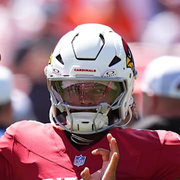 Aug 25, 2024; Denver, Colorado, USA; Arizona Cardinals quarter back Kyler Murray (1) before the game against the Denver Broncos at Empower Field at Mile High. Mandatory Credit: Ron Chenoy-Imagn Images