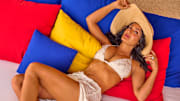 Salma Hayek Pinault was photographed by Ruven Afanador in Mexico. Swimsuit by Sara Cristina. Skirt by SIEDRÉS. Hat by Janessa Leoné. Body chain by Jac