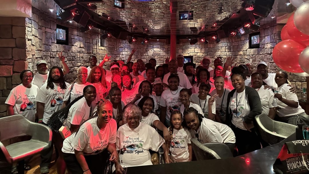 Family and friends of Falcons fan, Tim Wilcox, celebrate his 60th birthday on a Royal Caribbean cruise ship. Customized t-shirts included a picture of Wilcox wearing a Kyle Pitts jersey.