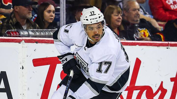 Apr 16, 2026; Calgary, Alberta, CAN; Los Angeles Kings right wing Mathieu Joseph (17) skates with the puck against the Calgary Flames during the first period at Scotiabank Saddledome. Mandatory Credit: Sergei Belski-Imagn Images