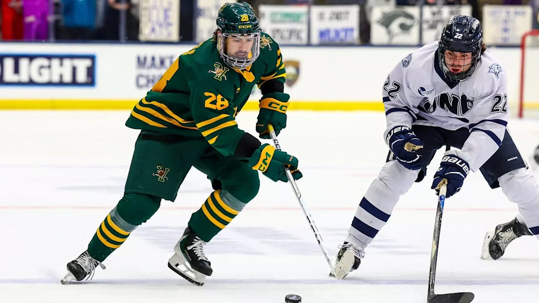 Vermont Freshman Matteo Michels skates past New Hampshire freshman Felix Gagnon Vermont Freshman Matteo Michels skates past New Hampshire freshman Felix Gagnon