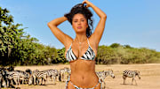 Salma Hayek Pinault was photographed by Ruven Afanador in Mexico. Swimsuit by Ark Swimwear. Necklace and body chain by Jacquie Aiche.