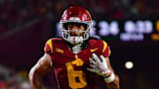 Sep 20, 2025; Los Angeles, California, USA; Southern California Trojans wide receiver Makai Lemon (6) runs for a touchdown against the Michigan State Spartans during the second half at the Los Angeles Memorial Coliseum.  