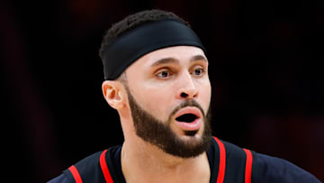 Larry Nance Jr. #22 of the Atlanta Hawks looks to pass against the Miami Heat.