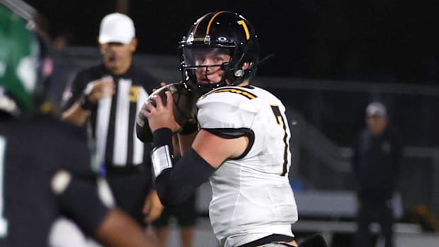 Michigan's 2026 quarterback commit, Brady Smigiel, is averaging  310 passing yards per game in his senior season.