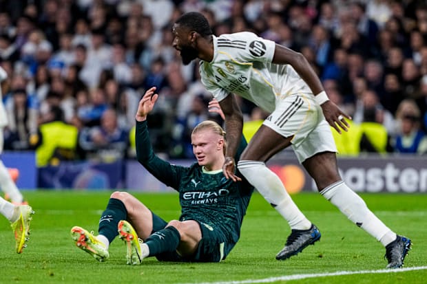 Erling Haaland (left) and Antonio Rüdiger. Erling Haaland (left) and Antonio Rüdiger.