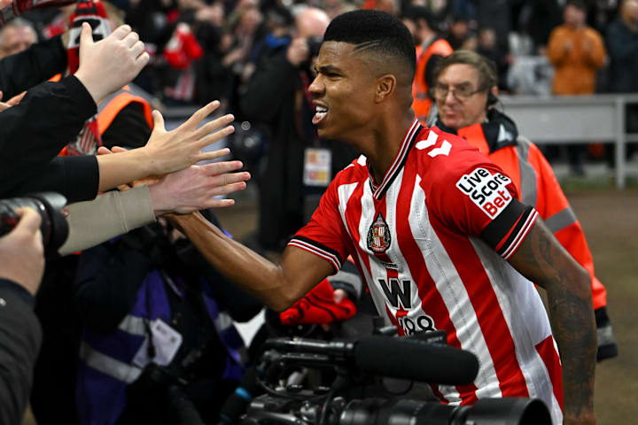 Reinildo celebrating.