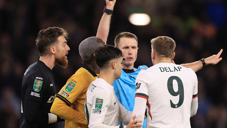 Chelsea’s Liam Delap (right) receiving a second yellow card.