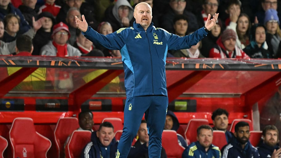 Sean Dyche with arms outstretched.