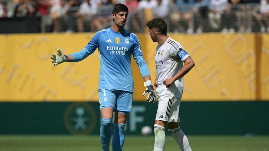 Thibaut Courtois (left) and Federico Valverde.